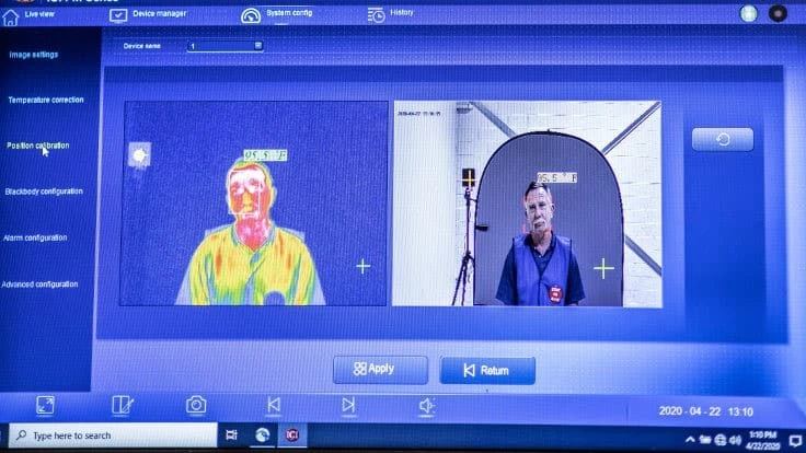 Ford workers will stand in front of a scanner to ensure they don't have fevers before being allowed to come into plants.