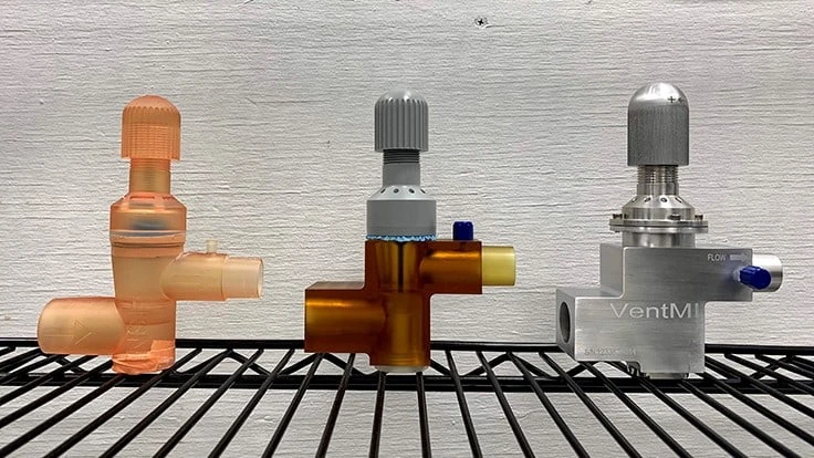 Progression of the VentMI from 3D printed version, to the machined plastic, to the final production is shown in the photo from left to right.
