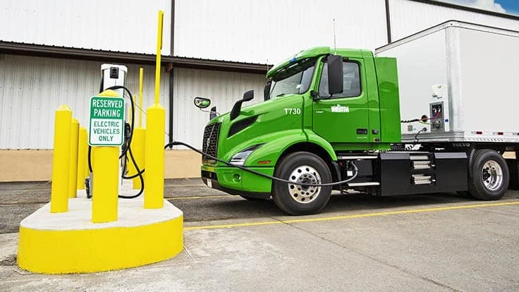 A Manhattan Beer Distributors Volvo VNR Electric charges up at the company’s distribution warehouse in the Bronx, New York.
