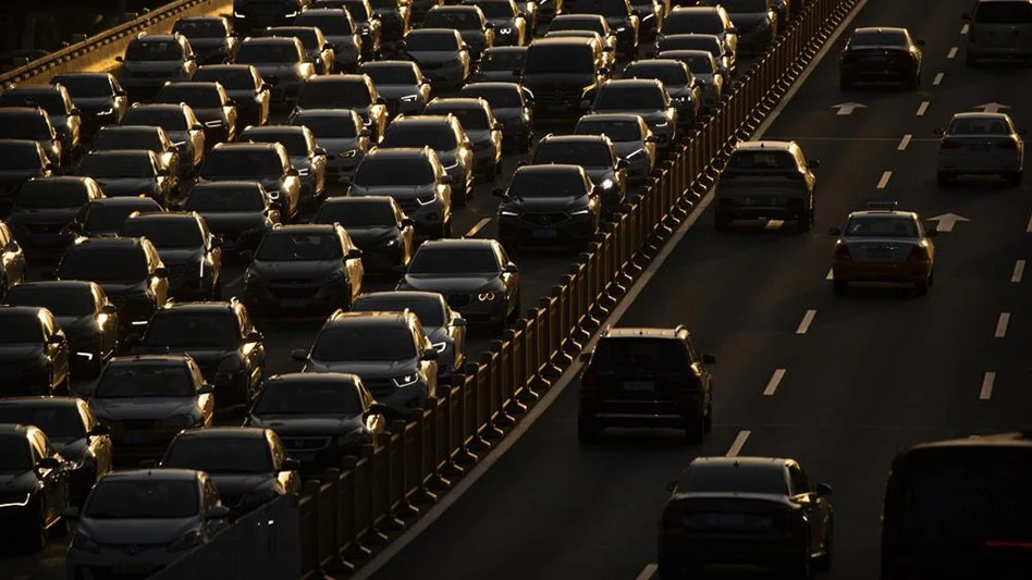Rush hour traffic backs up along a highway in Beijing, China, on April 23, 2020. Hainan island in the South China Sea said Monday, Aug. 22, 2022 that it will become China's first region to ban sales of gasoline- and diesel-powered cars to curb climate-changing carbon emissions.
