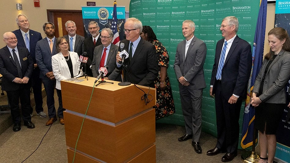 President Harvey Stenger, at the podium, is flanked by members of the New Energy New York coalition at the news conference held following President Joe Biden's announcement that the Binghamton University-led coalition's proposal was one of only 21 selected for American Rescue Act Build Back Better Challenge funding and will receive $63.7 million.