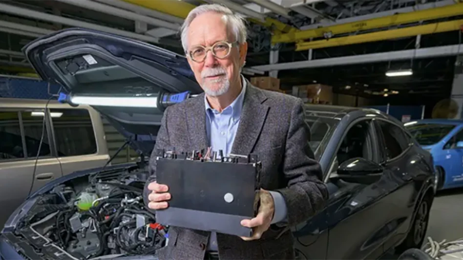 UD’s Willett Kempton holds an electric vehicle (EV) battery module in his research lab at UD’s Science, Technology and Advanced Research (STAR) Campus. Kempton and his team are partnering with industry to develop technology and international standards that accelerate the electrification of transportation and the integration of electric vehicles with the power grid.