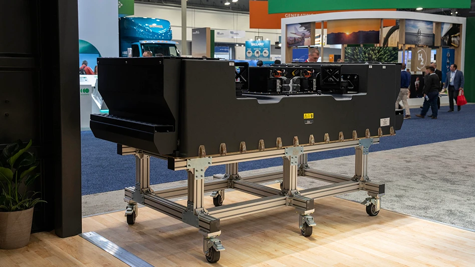 The high-voltage battery pack manufactured by Hexagon Purus for Toyota's heavy-duty fuel cell electric powertrain kit has 693V max system voltage, maximum installed capacity of 247kWh, and a typical usable capacity of 218kwh. A Hexagon Purus battery pack was on display at booth 2244 at Advanced Clean Transportation (ACT) Expo in Las Vegas.