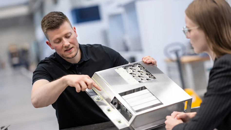 A TRUMPF employee explains where the battery will be cut open by the laser