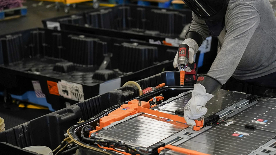 An electric vehicle being dismantled to be recycled at a Cirba Solutions facility