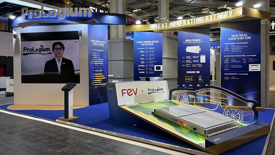 A large battery on display at a show floor booth