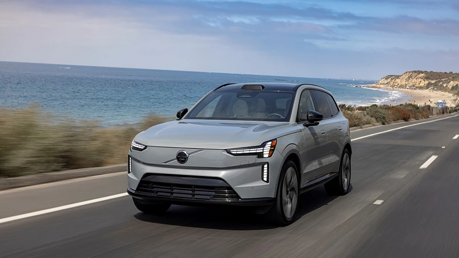 A car drives down a freeway