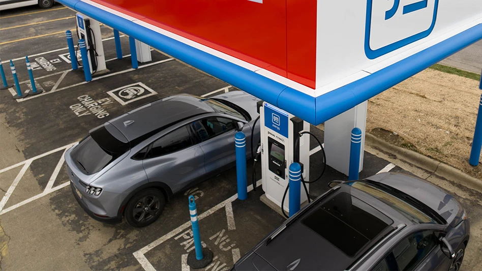 Cars parked at electric vehicle charging stations