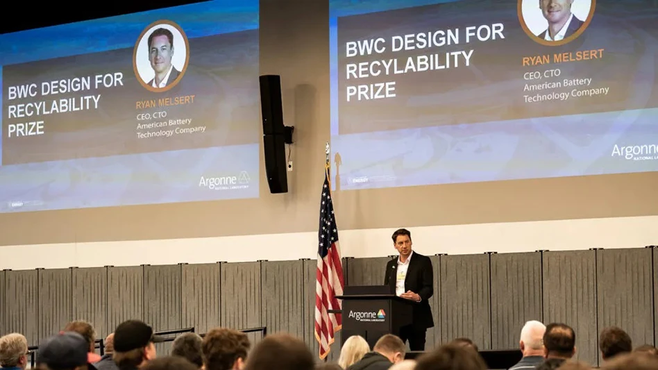 A person stands at a podium