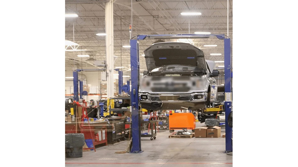A car on a factory floor