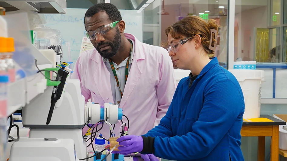 Two people working in a lab