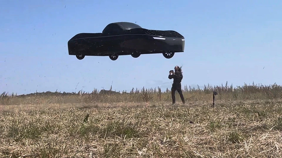 A person standing by a flying car