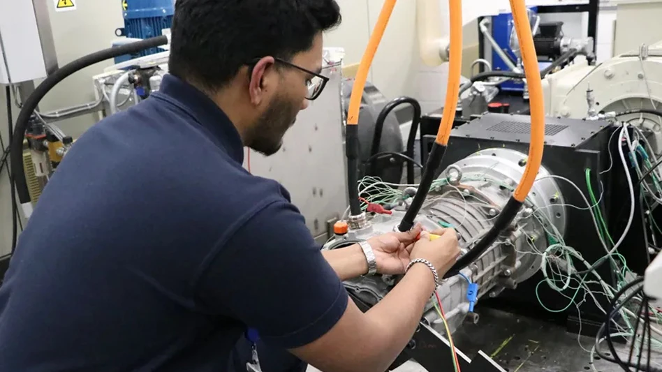 A person working on a motor