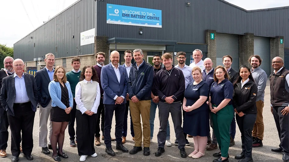 A group of people standing in front of a building