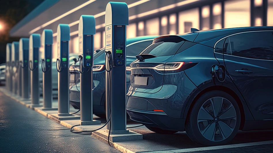 A line of electric vehicles at chargers