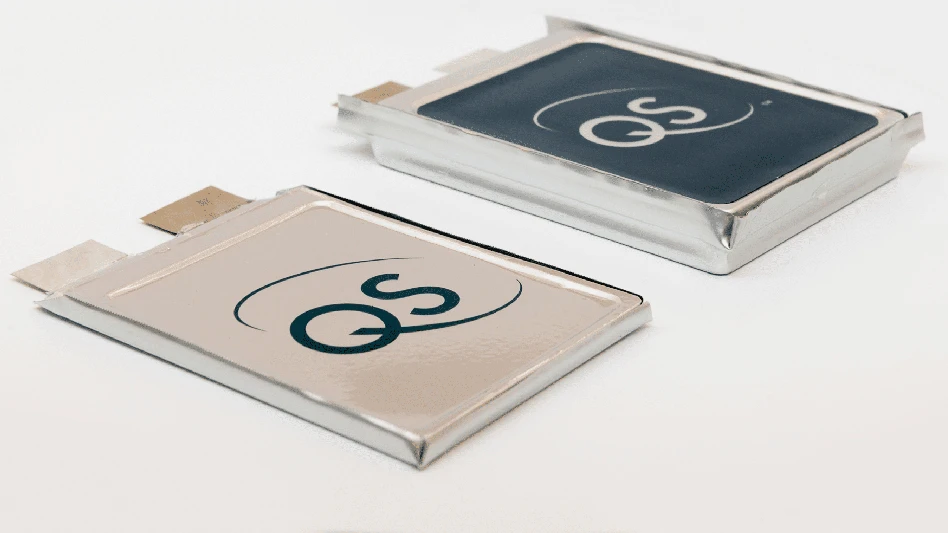 Two lithium battery cells with QS printed on them