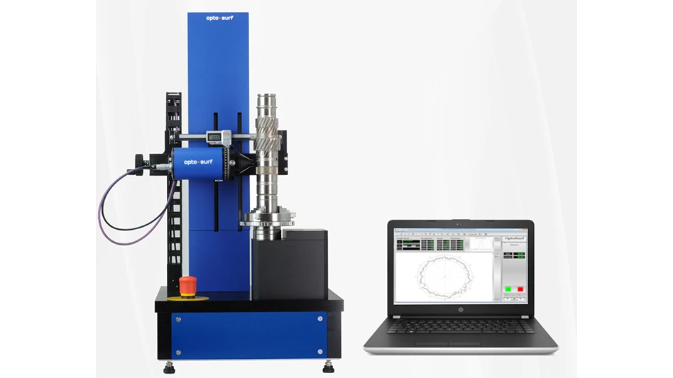 A metrology instrument next to a laptop computer